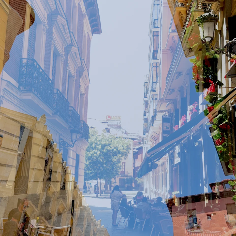 Colorful buildings layered along a narrow street.